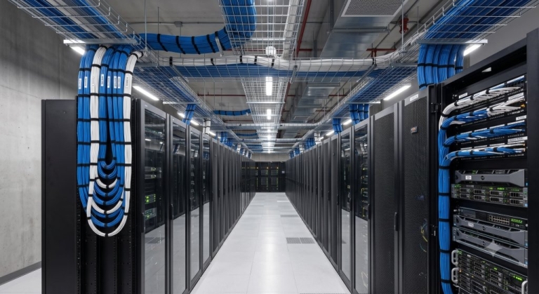 Data center structured cabling with labeled blue and white cable runs